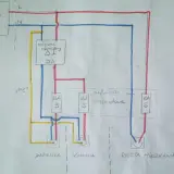 Schemat rozdzielenia instalacji elektrycznej na dwa liczniki. Widać rozdzielacz z wyłącznikiem różnicowoprądowym 25A i wyłączniki nadprądowe 16A i 10A dla łazienki, kuchni i reszty mieszkania.