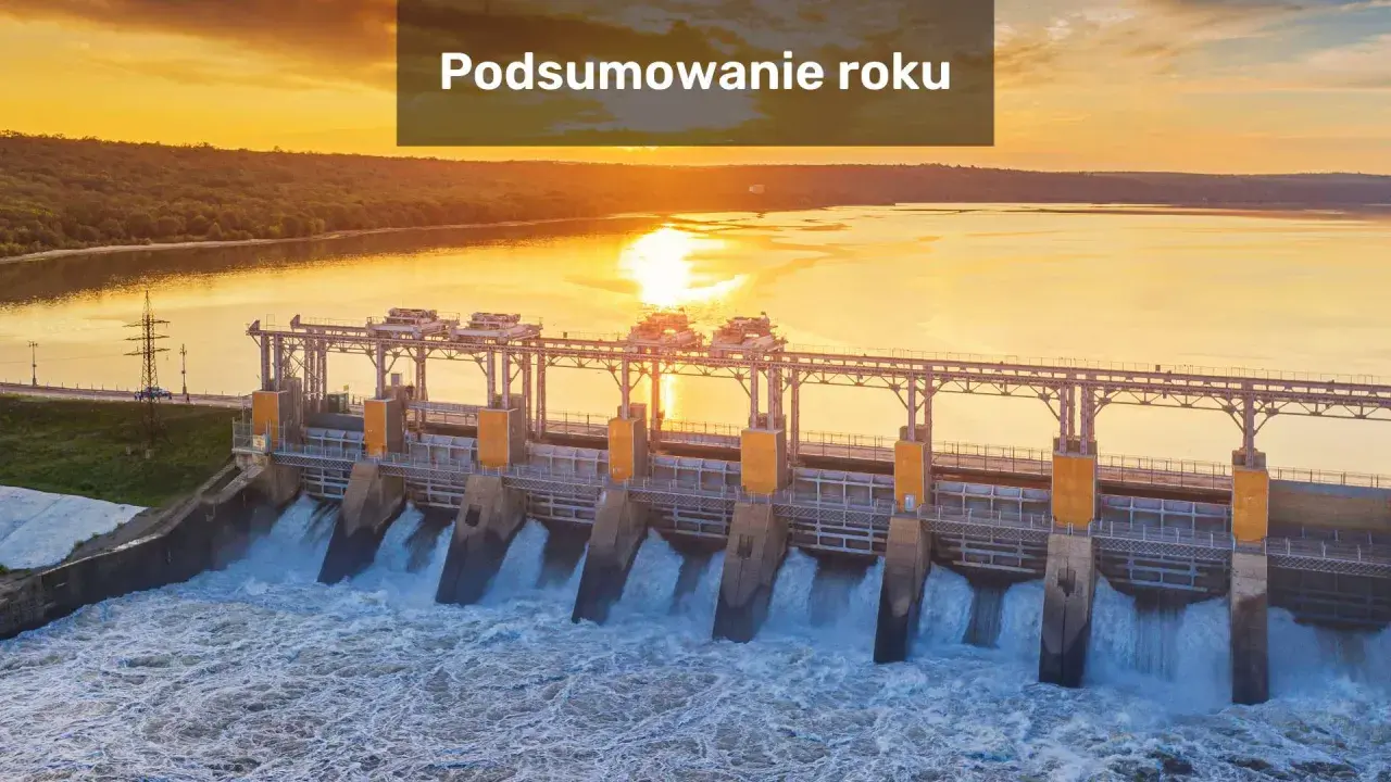 Potężne elektrownie wodne pracują pełną parą, tworząc spektakularny widok przy zachodzącym słońcu.